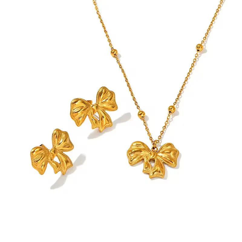 Golden Bow Glam Set – Statement Earrings & Necklace