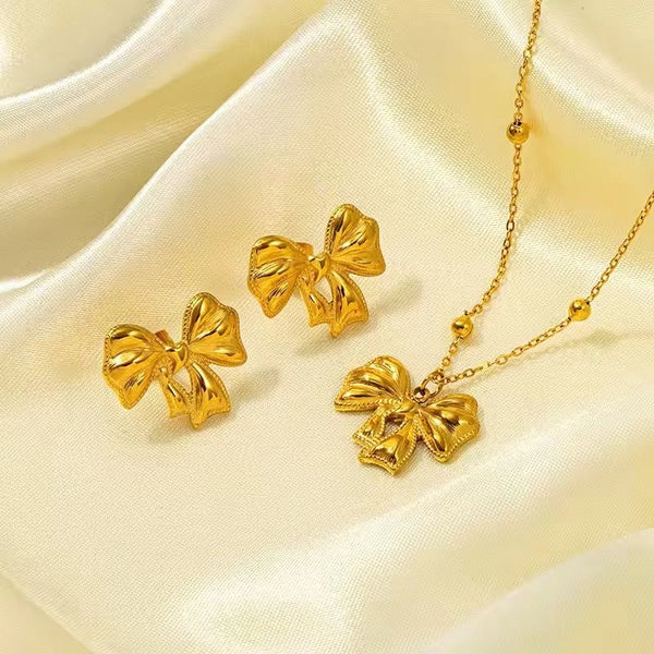 Golden Bow Glam Set – Statement Earrings & Necklace